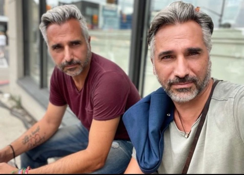 Eric Tadros (burgundy sweater, left) and Daniel Tadros (grey sweater, right)